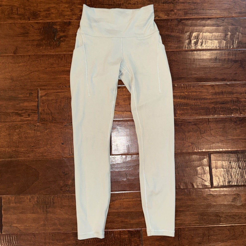 Athleta Salutation Stash Pocket 7/8 Tight Leggings Size 4 Pale Green Yoga